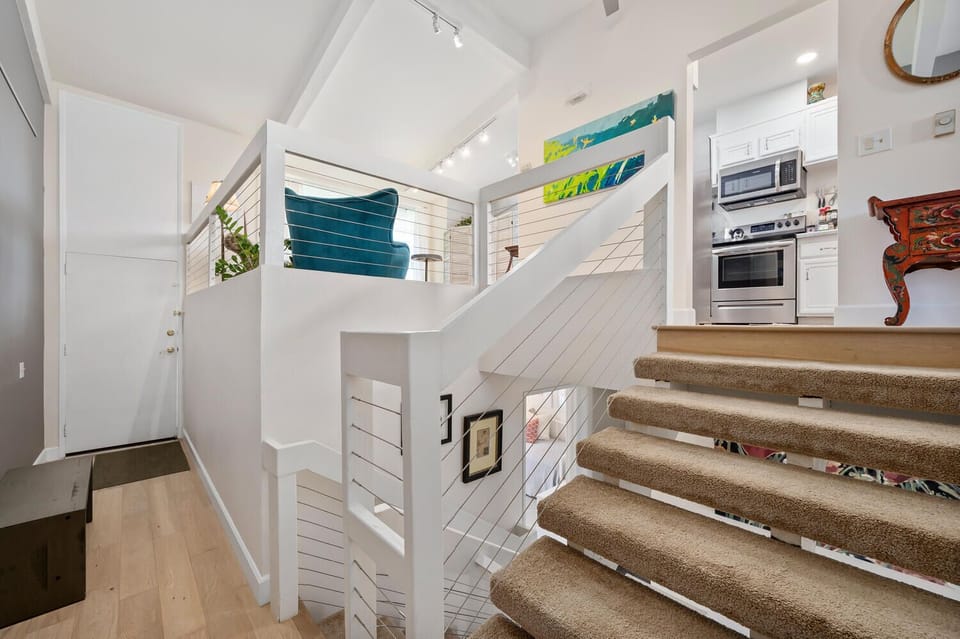 Front entry up to top level. Note: this home has 3 levels with carpeted stairs. 