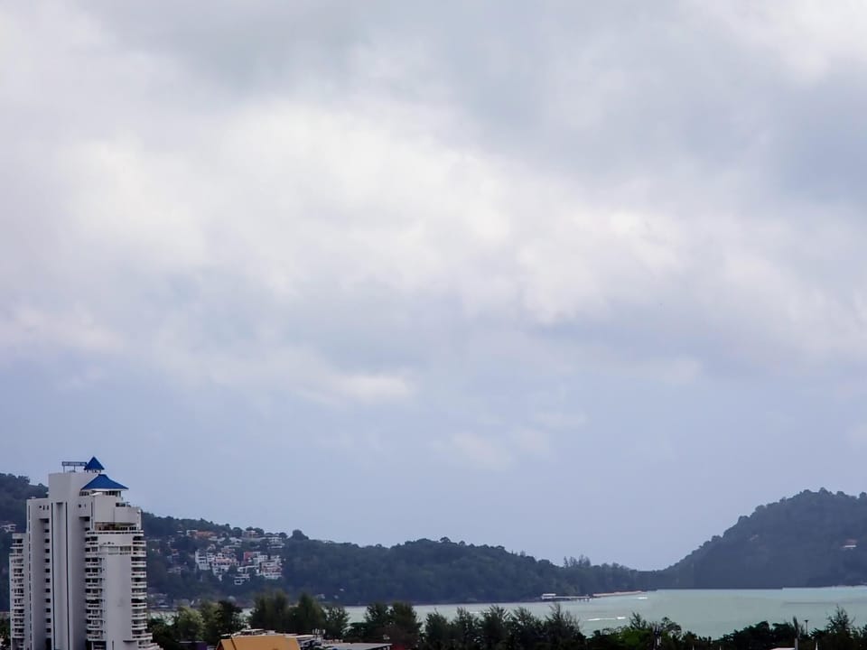 Bright Patong sea view studio - quiet spot, pool (14926)