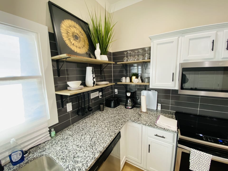 coffee maker, wine glasses and cups