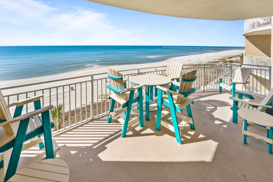 Sip your morning coffee on your private beachfront balcony while watching waves roll in and seabirds dance along pristine white sand.
