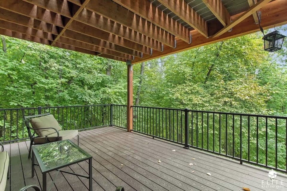 Enjoy this massive deck with gorgeous trees and birds singing.