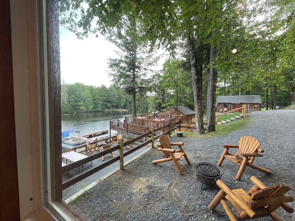 View from living room.  Fore pit and log-style ADK chairs
