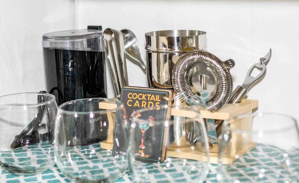 Provided amenities include: Coffee bean grinder, cocktail mixing set, and of course plenty of wine glasses.