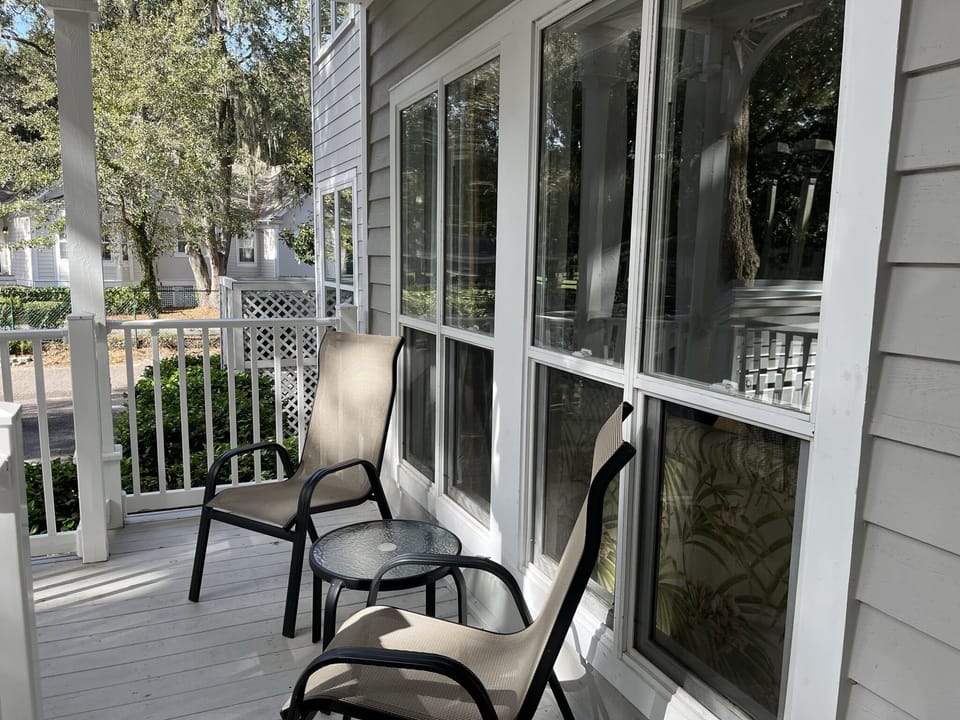 Outdoor Balcony overlooking pool