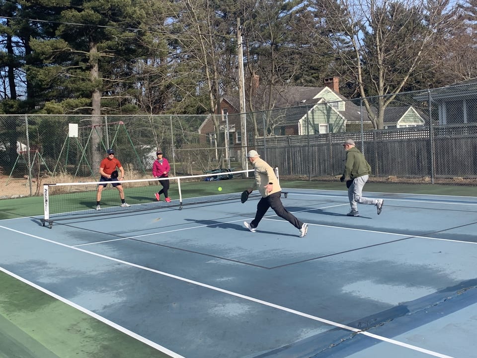 Tennis, Pickelball, and playground within the Shorewood Hills Community