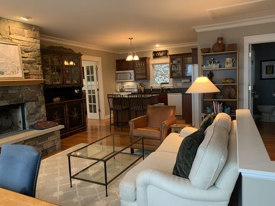 Kitchen/Dining/Family Room with powder room door on right
