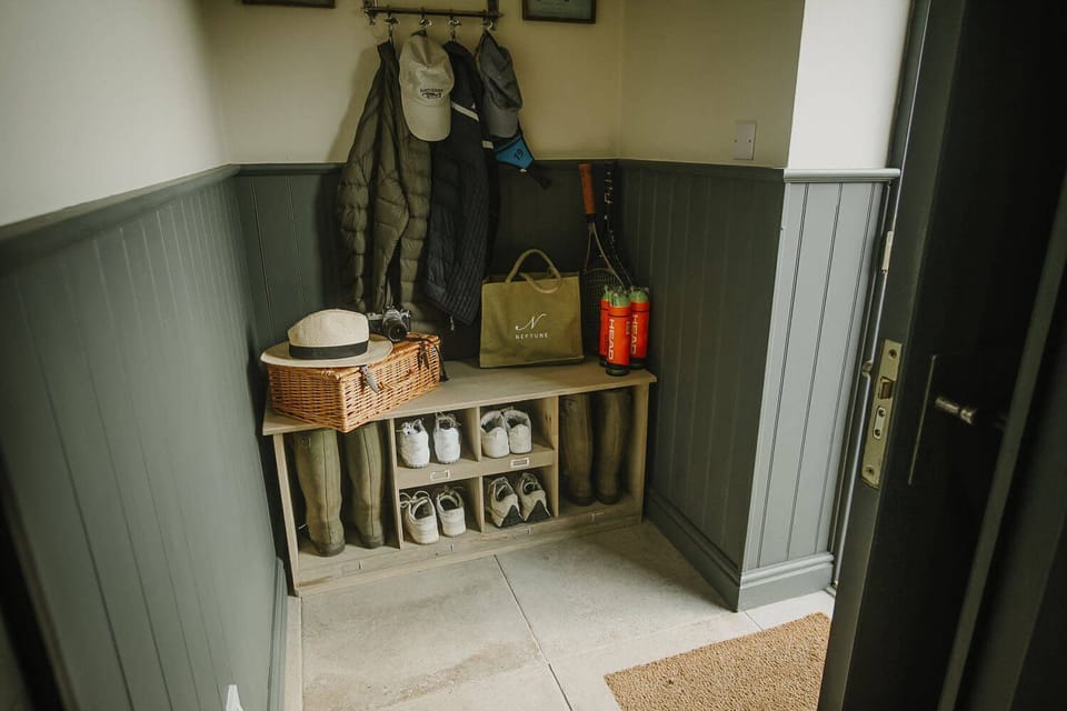 Ground floor: Entrance with boot room, storage & hanging