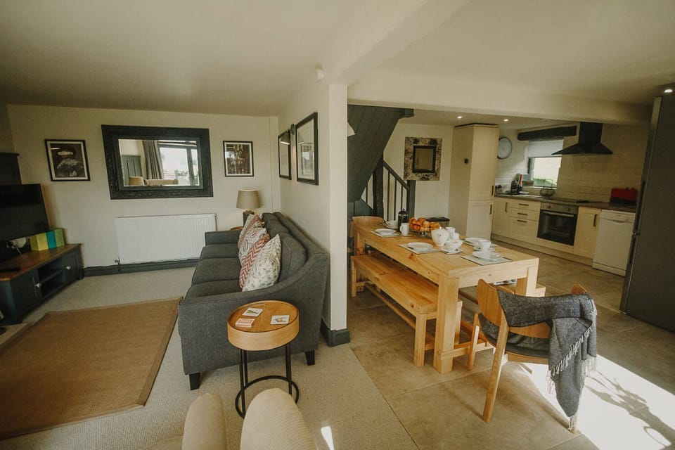 Ground floor: Open plan living space with clearly identified areas