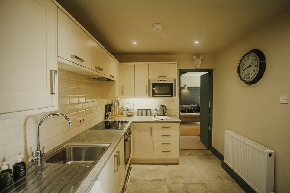 Open plan kitchen with access to lounge