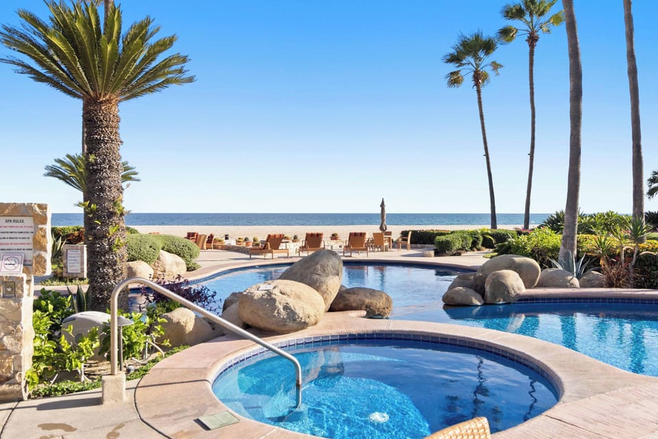Hot tub, adult pool, and kids pools right out your front door