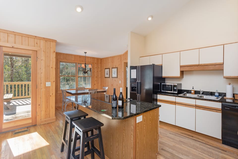 Kitchen and Dining & a view of Back Porch