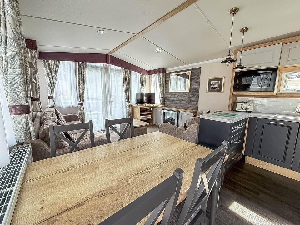 The kitchen allows you to dine on your own schedule and enjoy the comforts of home while on holiday.