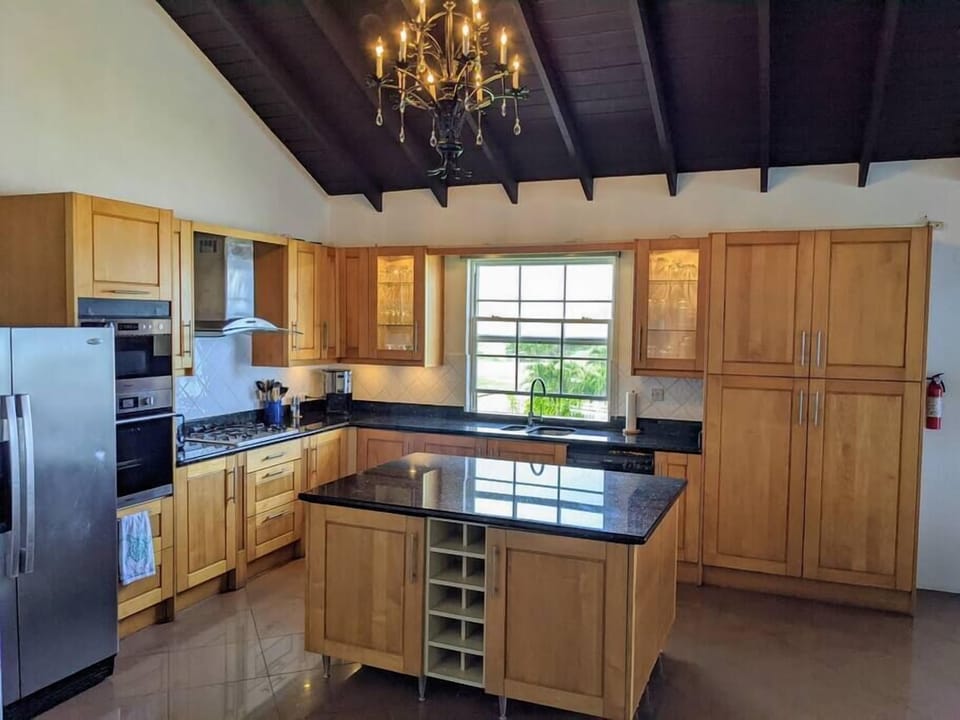 Large beautiful open kitchen with great breezes from the East window