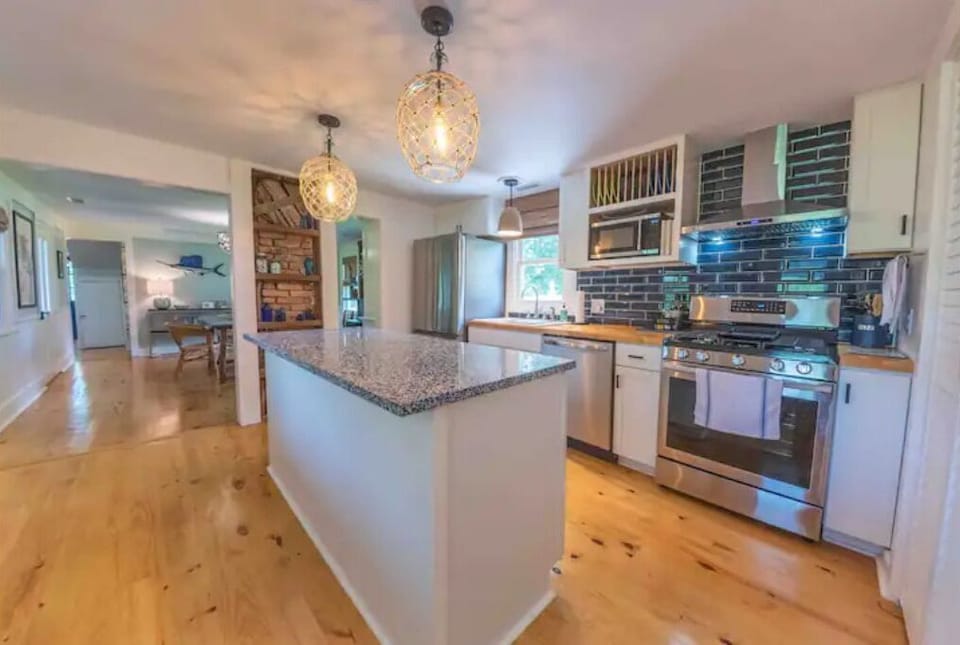 Kitchen Island with a stunning glass counter. 
