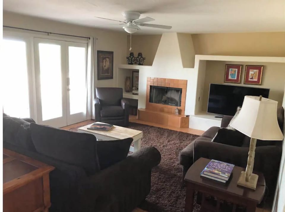 living room w wood burning fireplace