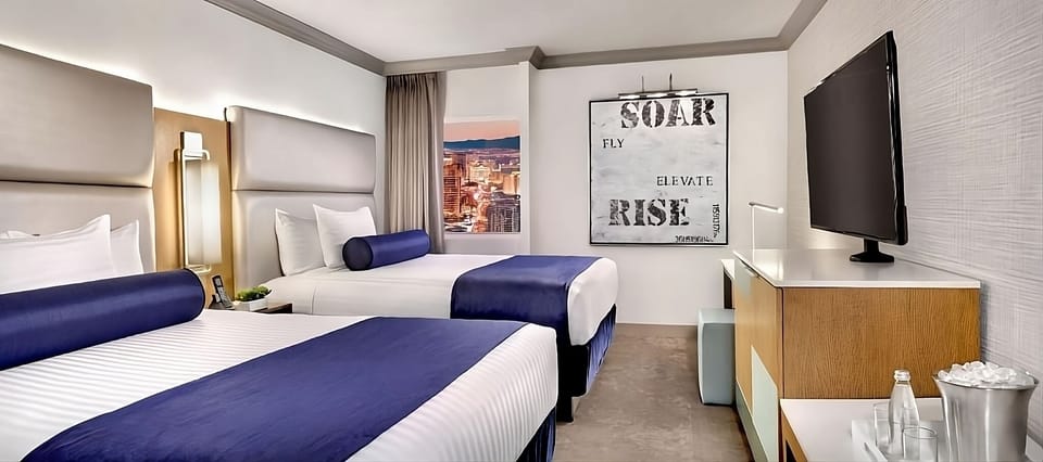 Settle into spacious double-queen style with entertainment at hand.