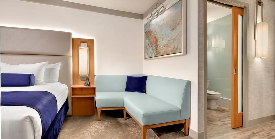 Lounge on the cozy corner sofa before drifting off to sleep.