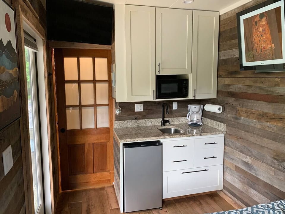 Kitchenette with drip coffee maker, toaster, microwave and hot plate 