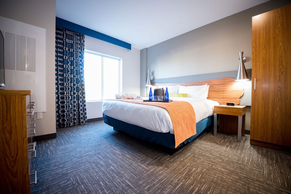 Wake up refreshed in a bright king bedroom with modern style.