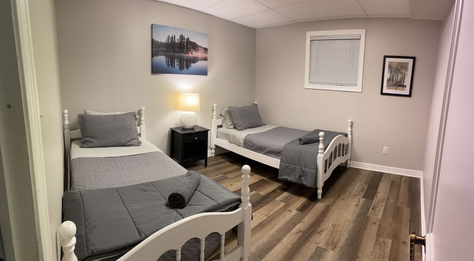 Basement Bedroom #2 with 2 single beds.