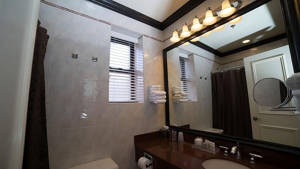 Get ready easily under bright lights with a wide mirror.