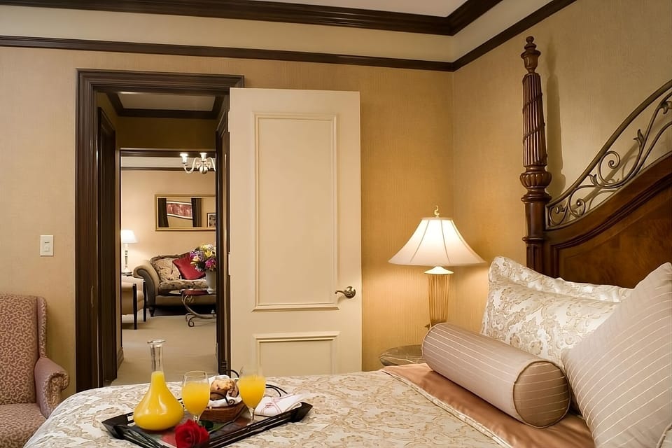 Wake up slowly with breakfast in bed and soft lighting.