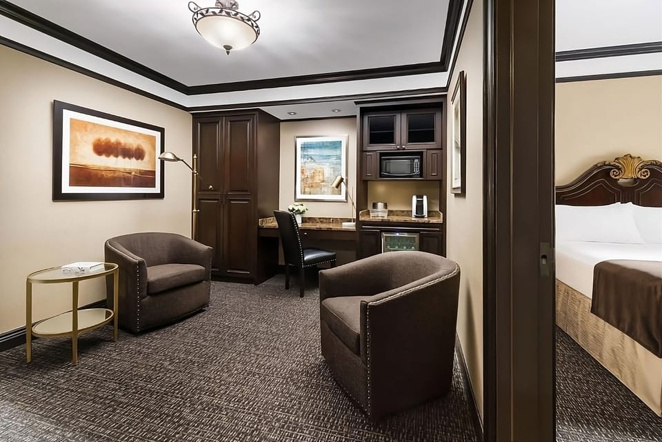 Unwind in the spacious sitting area with convenient wet bar.