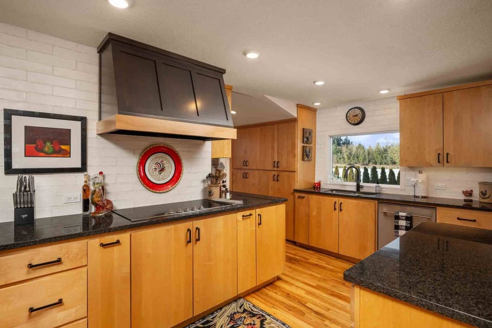 The kitchen is so spacious with ample counter space. Enjoy the room to prepare a feast for the whole family.