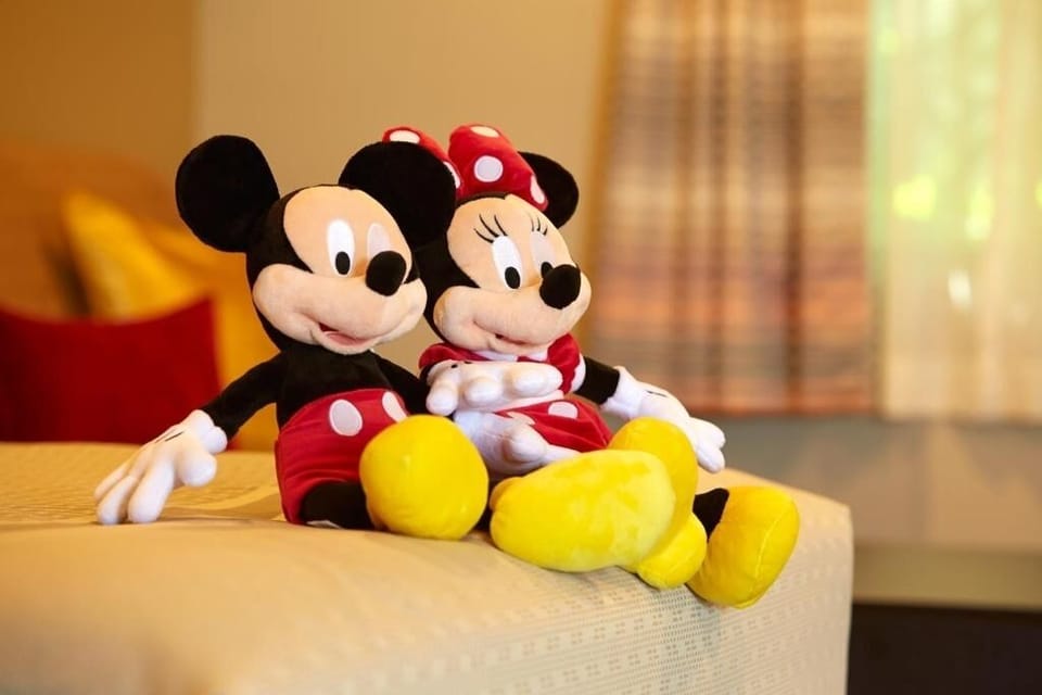 Imagine family-friendly comfort with playful touches on crisp bedding.