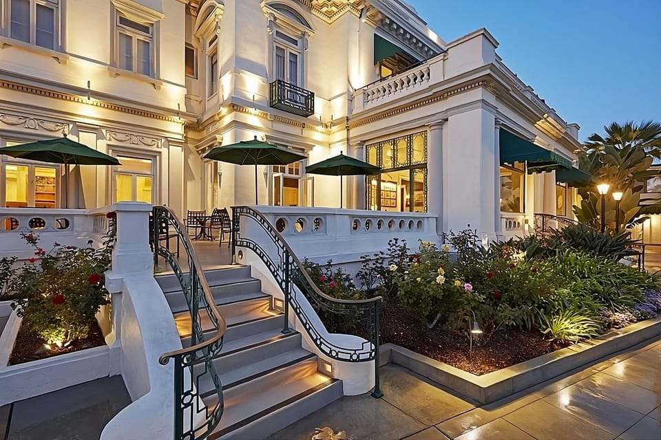 Step into an elegant entryway glowing with evening charm.