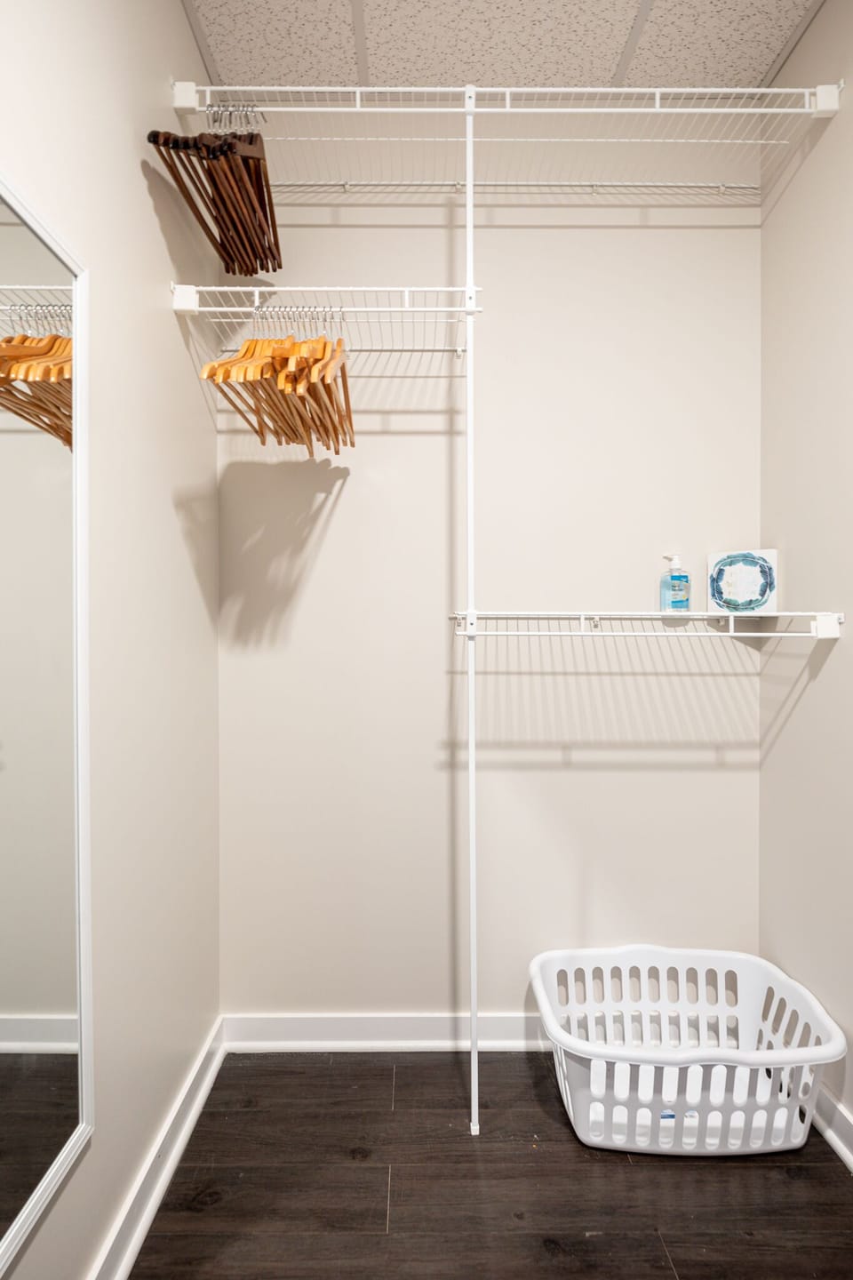 Closet w/ hanging rod & shelf space to keep your clothes organized.