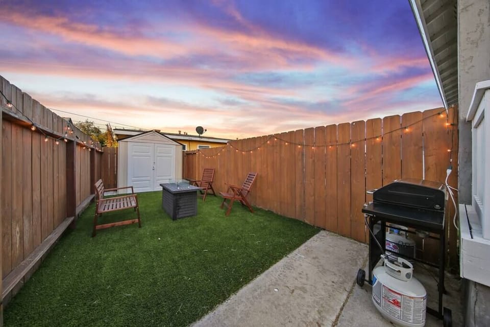 Private Turf Area | BBQ Grill | Seating and Electric Fireplace