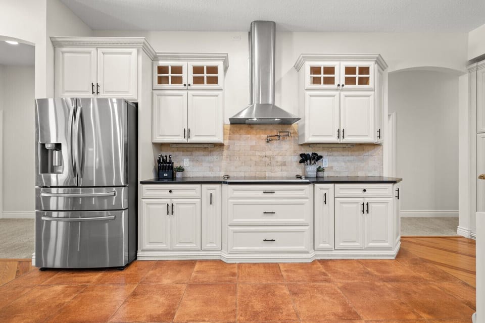 Induction stove top with more cooking supplies than you can ever need