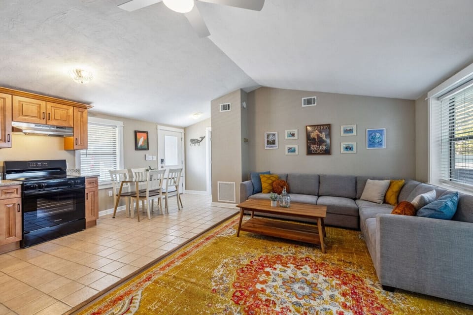 Open floor plan with dining, kitchen and living room