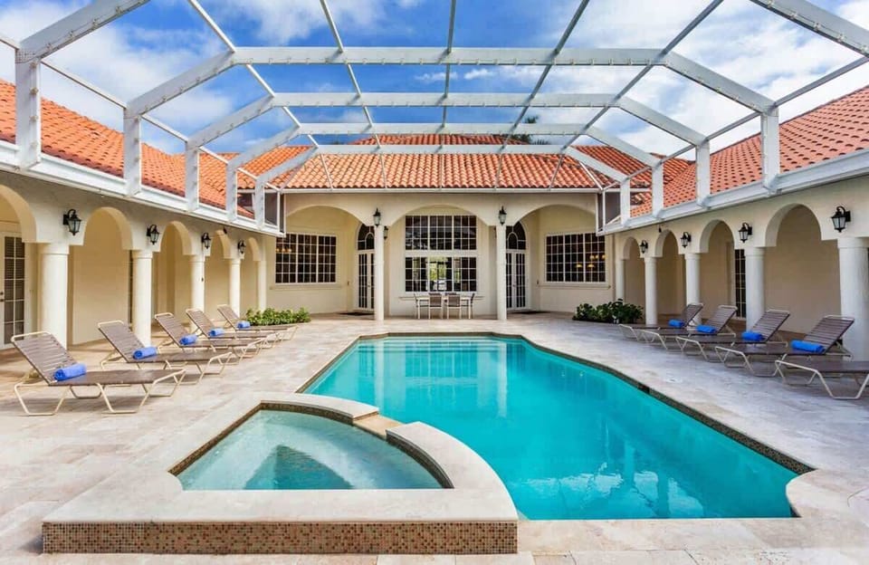 - Dive into relaxation at our inviting shared pool area of the home in Naples, Florida
- Cool off and unwind in the crystal-clear waters of our communal pool
- Soak up the sun and enjoy poolside lounging and dinning in our expansive outdoor area