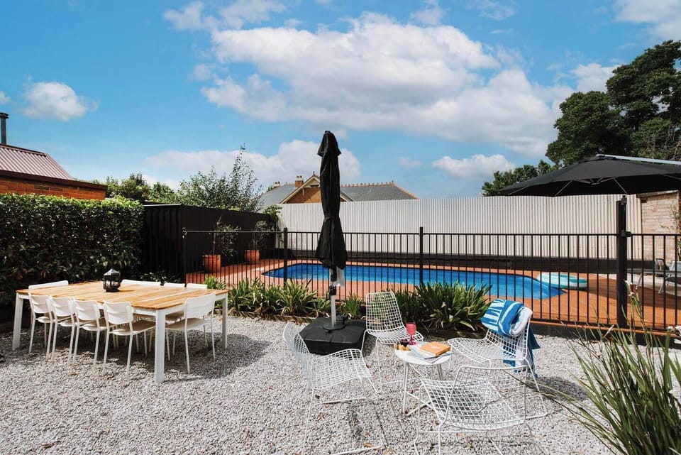 Jump into the pool or gather around the alfresco table and soak up the sun, the home features a sprawling indoor-outdoor living to slow down and unwind. 