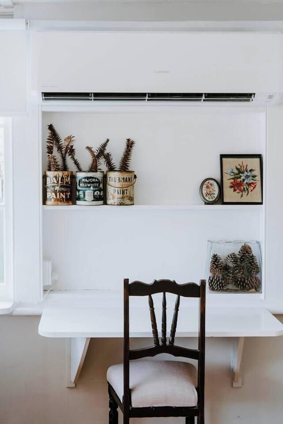 A dedicated workspace within the main living area provides a comfortable area for taking in Zoom calls.