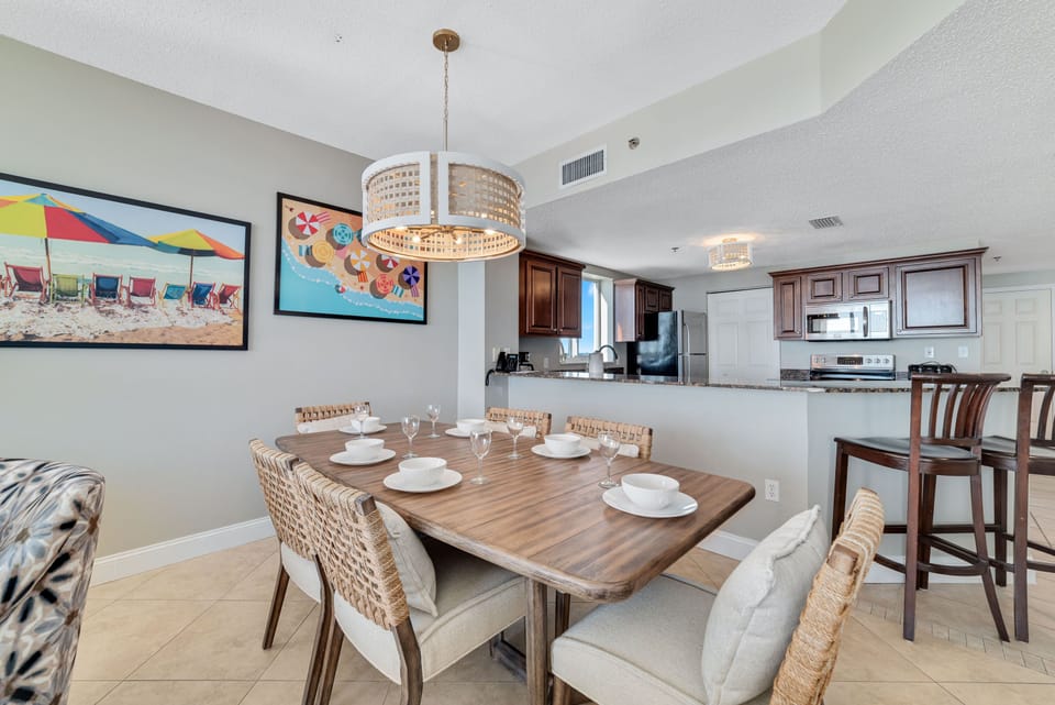 Gather, eat, and make memories. Our spacious dining area and adjacent breakfast bar provide plenty of room for guests to enjoy meals and conversations, creating the perfect setting for your vacation.