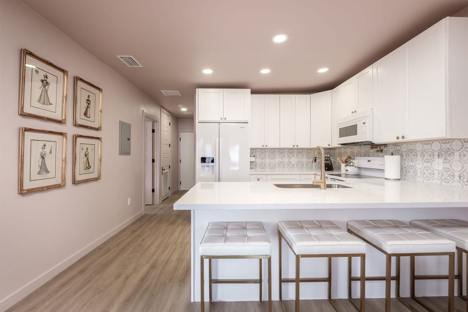 Kitchen and hallway. Hallway door at the ends leads into adjacent "Kate" unit which you can rent separately.