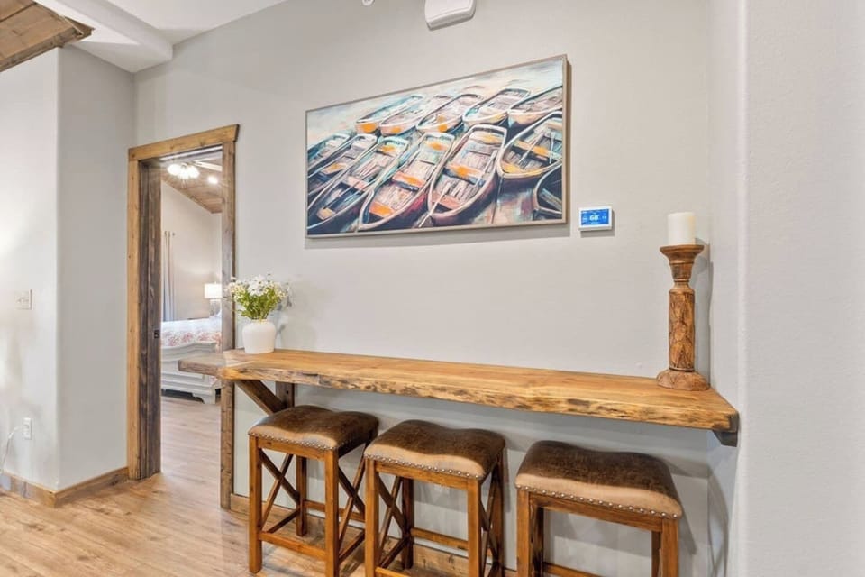 Gorgeous custom-made bar for more seating room.