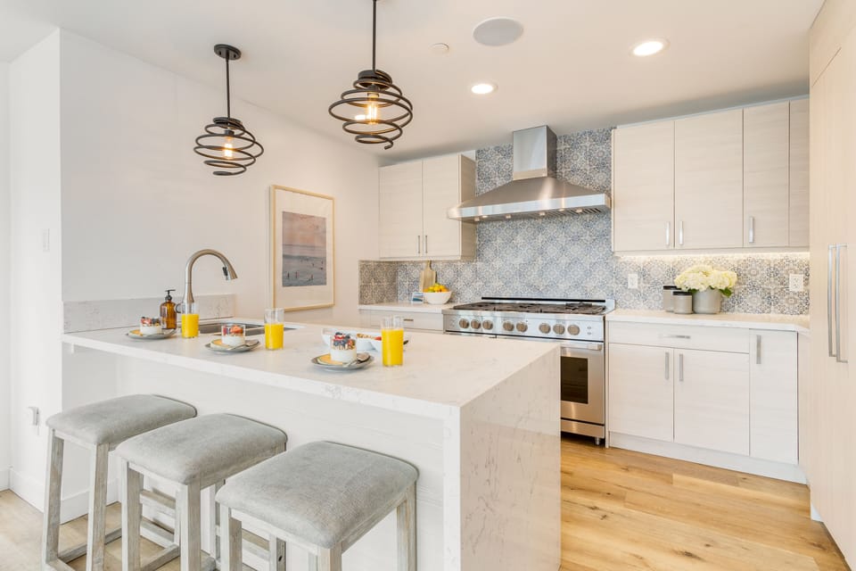Chic kitchen with barstool seating.