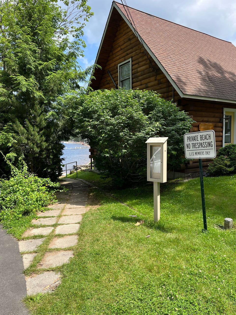 Entrance to associate beach off wards cove road