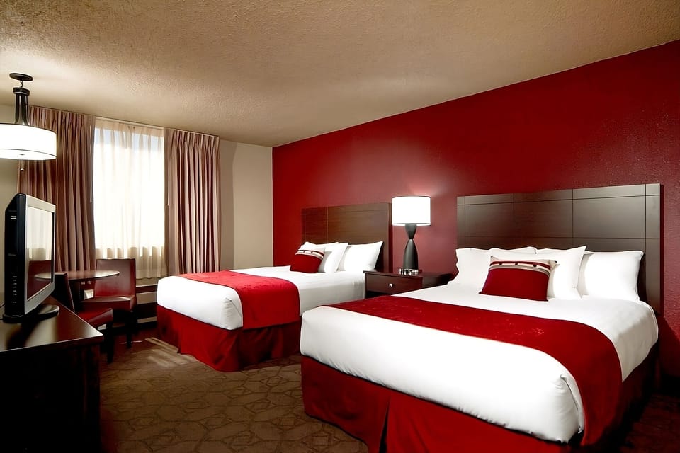 Settle into a spacious double-queen room with work desk.