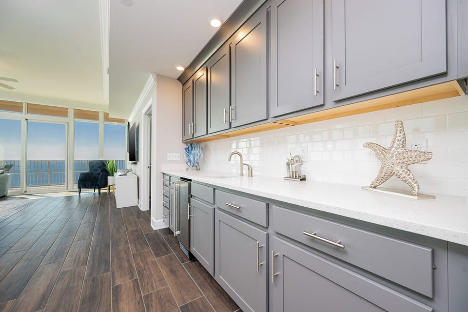 Grab a drink from the small fridge at the wet bar and savor gulf views from the balcony