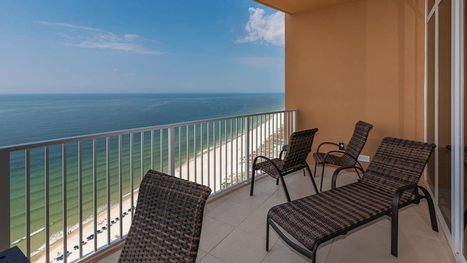 Stretch out on the loungers and watch the gulf curve along the shore below