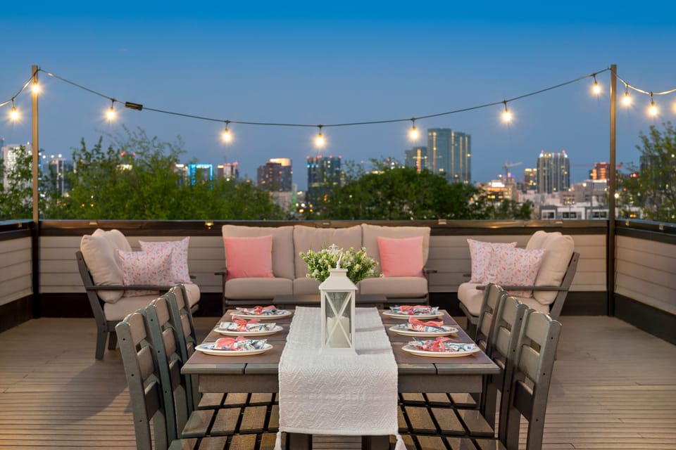 [Casa Rosalie] The Insta-Ready Rooftop Patio Offers a Beautiful View of the Nashville Skyline.