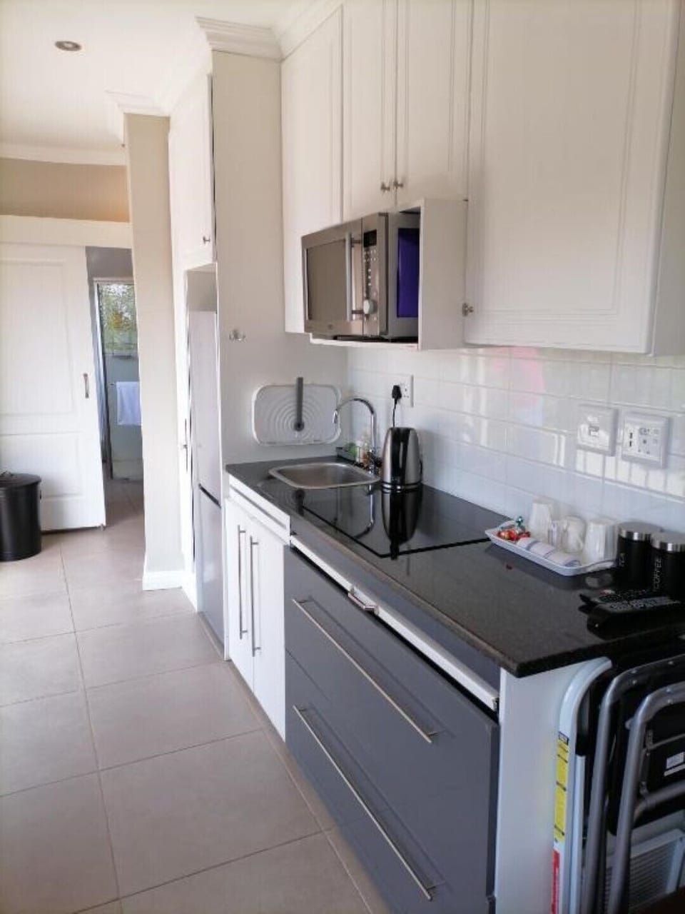 Modern kitchen with upmarket appliances.