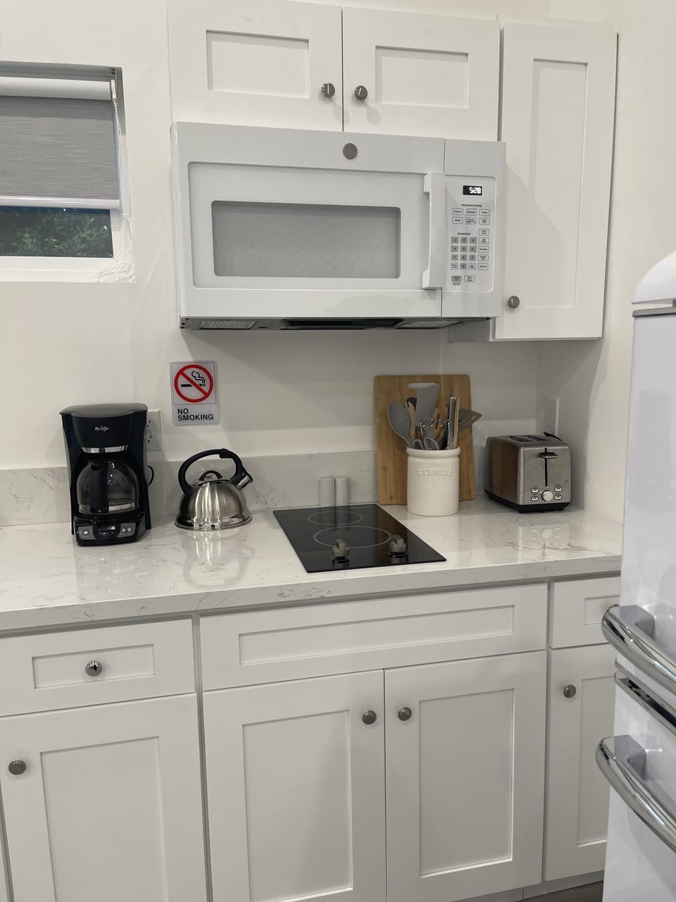 Coffee maker, two burner stove, top, toaster, microwave