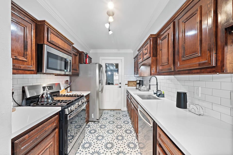  A well-equipped kitchen featuring updated appliances and generous prep space for easy, everyday cooking.