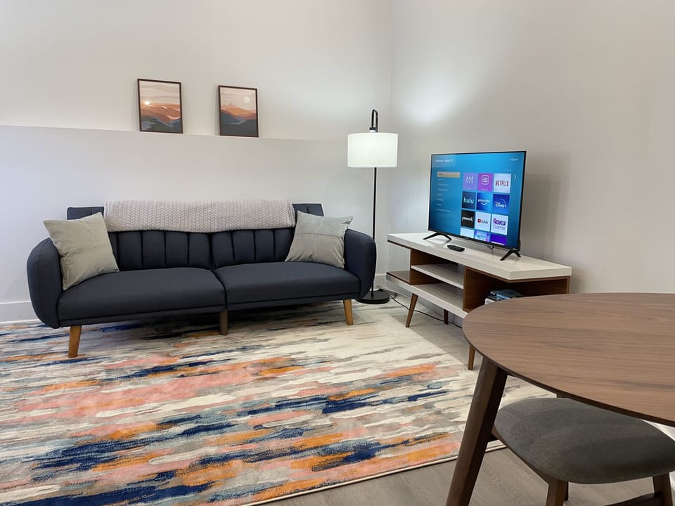 Living Room, couch can turn into a twin size sleeper.